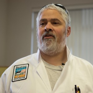 Lab coat with Mike Malveaux sq crop copy